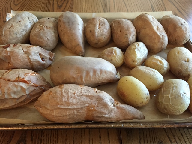 A sheet pan of baked potatoes. Nutmeg Notebook